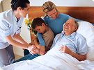 Healthcare team caring for elderly patient